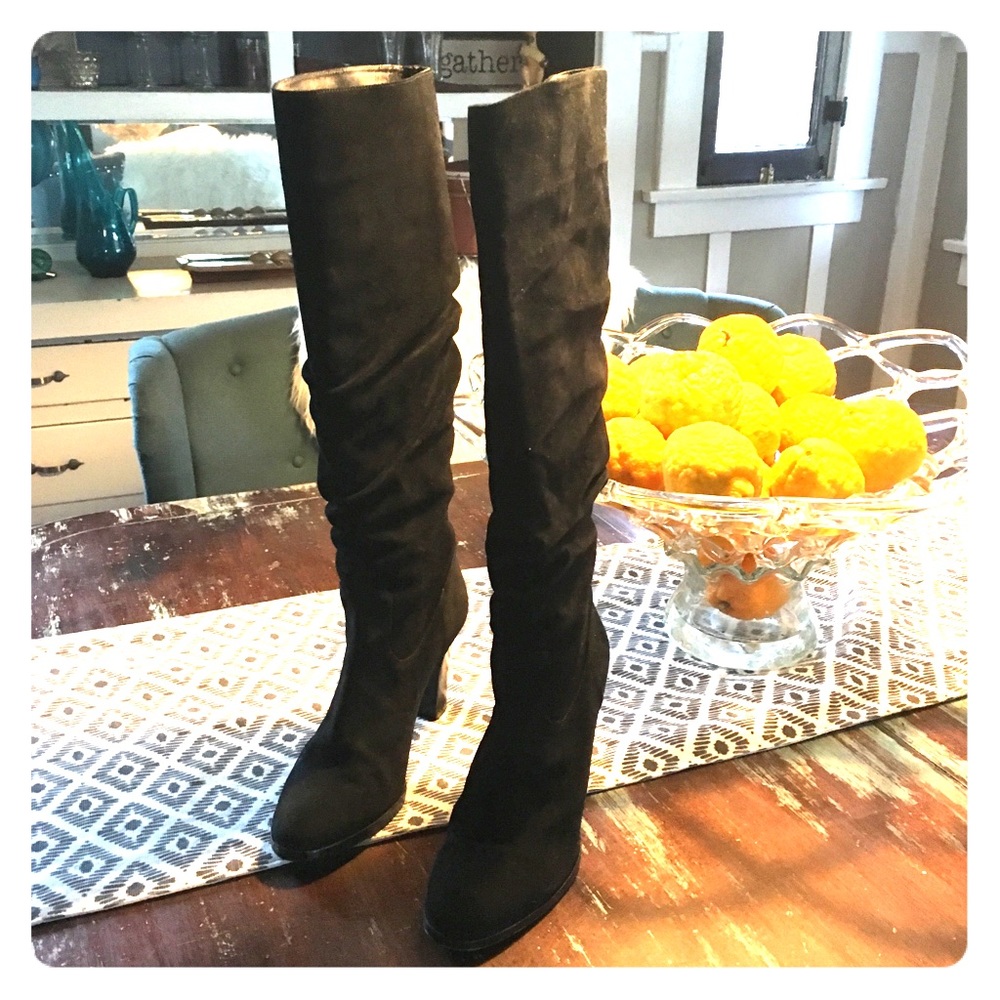 Tall suede black high heeled boots